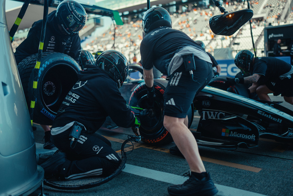 Mercedes pit crew working on car during pit stop